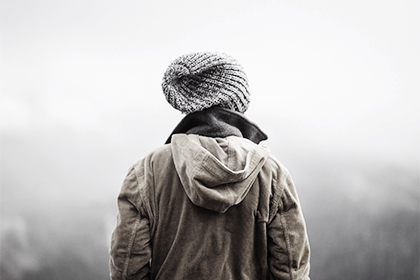 Woman in a hat and coat